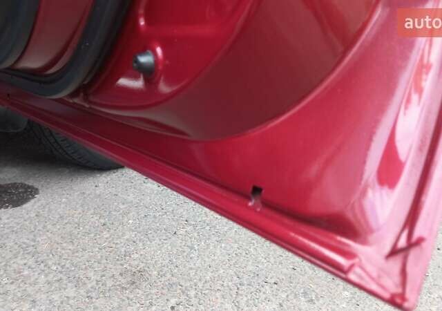 Червоний Ніссан Жук, об'ємом двигуна 1.6 л та пробігом 199 тис. км за 9700 $, фото 29 на Automoto.ua