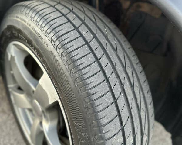 Красный Ниссан Жук, объемом двигателя 1.6 л и пробегом 168 тыс. км за 10900 $, фото 6 на Automoto.ua