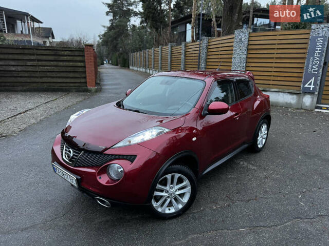 Червоний Ніссан Жук, об'ємом двигуна 1.6 л та пробігом 97 тис. км за 10750 $, фото 6 на Automoto.ua