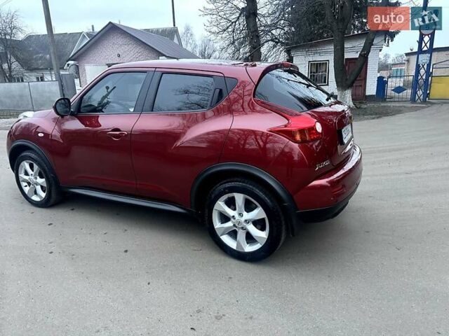 Червоний Ніссан Жук, об'ємом двигуна 1.6 л та пробігом 147 тис. км за 9999 $, фото 4 на Automoto.ua