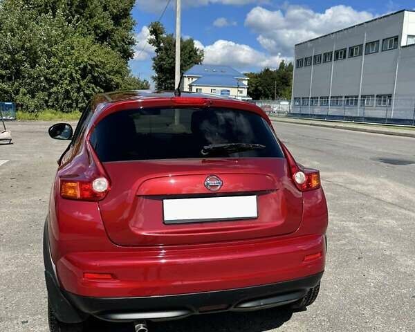 Червоний Ніссан Жук, об'ємом двигуна 1.6 л та пробігом 233 тис. км за 10000 $, фото 10 на Automoto.ua