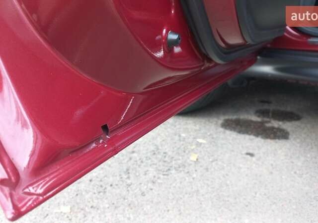 Червоний Ніссан Жук, об'ємом двигуна 1.6 л та пробігом 199 тис. км за 9700 $, фото 27 на Automoto.ua