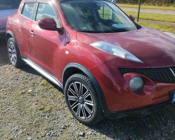 Червоний Ніссан Жук, об'ємом двигуна 1.6 л та пробігом 159 тис. км за 8900 $, фото 8 на Automoto.ua