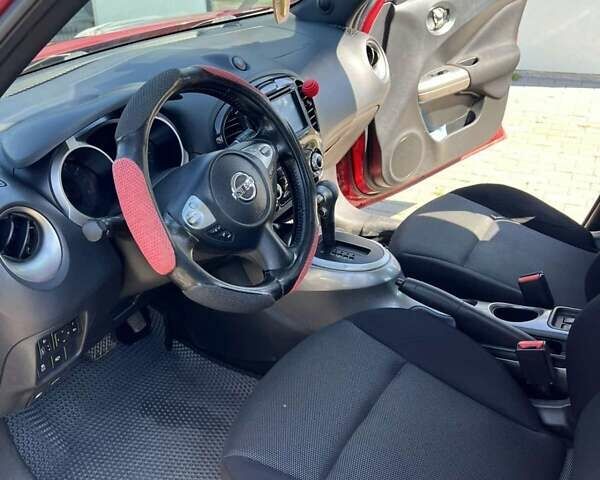 Красный Ниссан Жук, объемом двигателя 1.6 л и пробегом 125 тыс. км за 9700 $, фото 11 на Automoto.ua