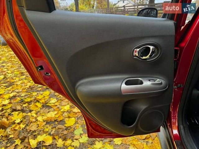 Красный Ниссан Жук, объемом двигателя 1.6 л и пробегом 131 тыс. км за 9990 $, фото 20 на Automoto.ua