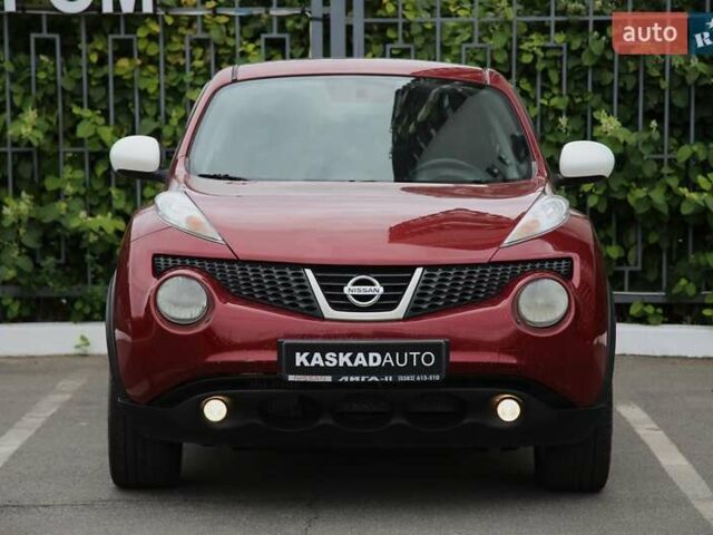 Красный Ниссан Жук, объемом двигателя 1.62 л и пробегом 154 тыс. км за 9900 $, фото 1 на Automoto.ua