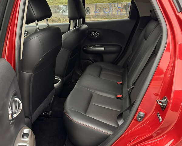 Червоний Ніссан Жук, об'ємом двигуна 1.6 л та пробігом 86 тис. км за 9999 $, фото 11 на Automoto.ua