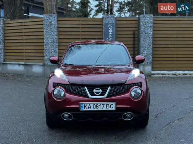 Червоний Ніссан Жук, об'ємом двигуна 1.6 л та пробігом 97 тис. км за 10750 $, фото 7 на Automoto.ua