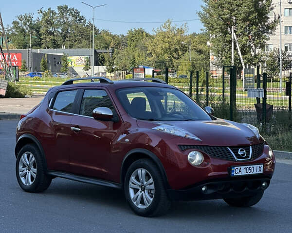 Красный Ниссан Жук, объемом двигателя 1.6 л и пробегом 198 тыс. км за 8300 $, фото 6 на Automoto.ua