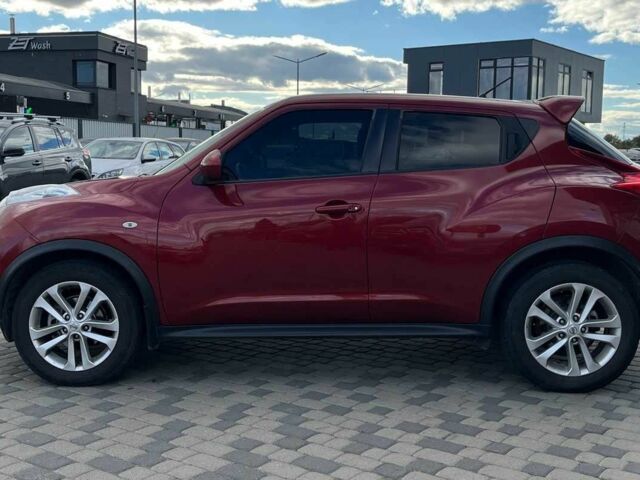 Красный Ниссан Жук, объемом двигателя 1.6 л и пробегом 209 тыс. км за 10900 $, фото 3 на Automoto.ua