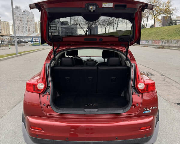 Червоний Ніссан Жук, об'ємом двигуна 1.6 л та пробігом 86 тис. км за 9999 $, фото 6 на Automoto.ua