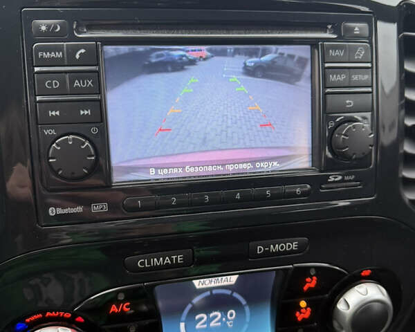 Червоний Ніссан Жук, об'ємом двигуна 1.6 л та пробігом 166 тис. км за 9600 $, фото 10 на Automoto.ua