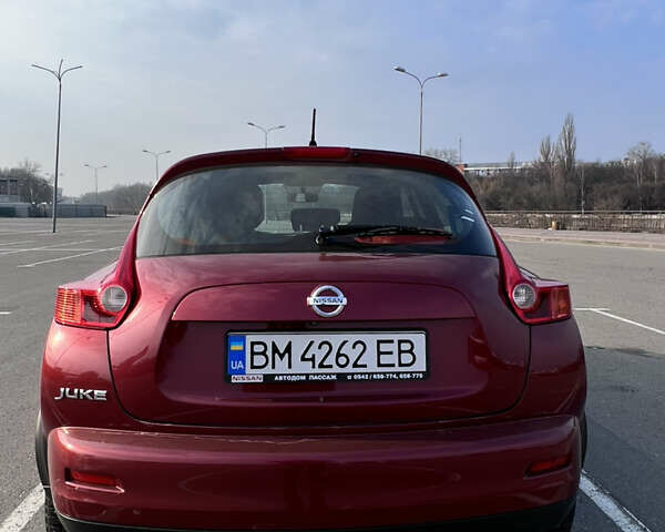 Красный Ниссан Жук, объемом двигателя 1.6 л и пробегом 61 тыс. км за 12500 $, фото 1 на Automoto.ua