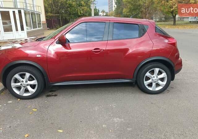 Червоний Ніссан Жук, об'ємом двигуна 1.6 л та пробігом 199 тис. км за 9700 $, фото 8 на Automoto.ua