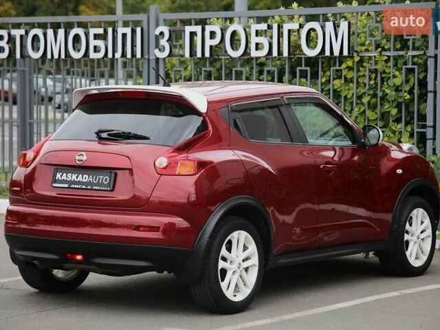 Красный Ниссан Жук, объемом двигателя 1.62 л и пробегом 154 тыс. км за 9900 $, фото 3 на Automoto.ua