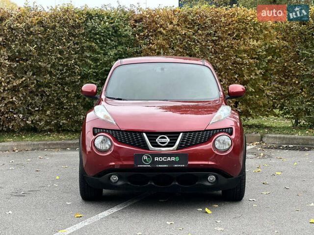 Красный Ниссан Жук, объемом двигателя 1.6 л и пробегом 130 тыс. км за 10500 $, фото 4 на Automoto.ua