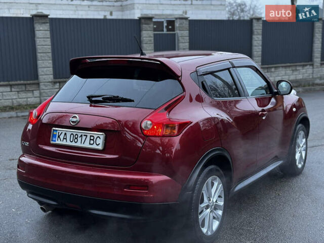 Червоний Ніссан Жук, об'ємом двигуна 1.6 л та пробігом 97 тис. км за 10750 $, фото 23 на Automoto.ua