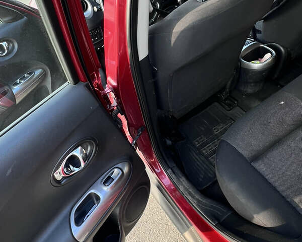 Красный Ниссан Жук, объемом двигателя 1.6 л и пробегом 61 тыс. км за 12500 $, фото 6 на Automoto.ua