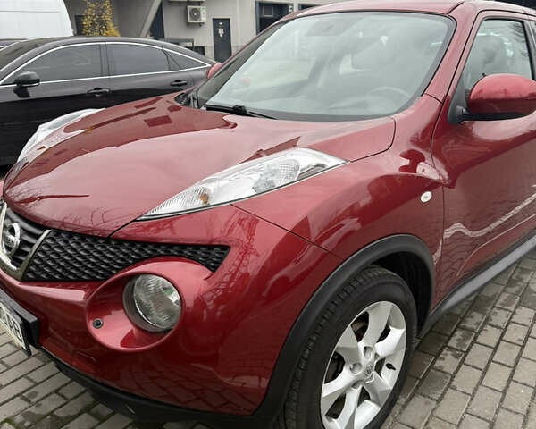 Червоний Ніссан Жук, об'ємом двигуна 1.6 л та пробігом 166 тис. км за 9600 $, фото 2 на Automoto.ua