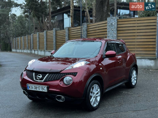 Червоний Ніссан Жук, об'ємом двигуна 1.6 л та пробігом 97 тис. км за 10750 $, фото 12 на Automoto.ua