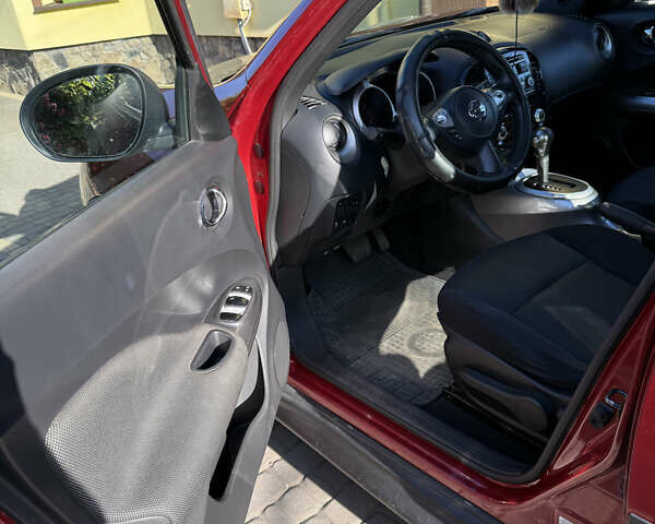 Червоний Ніссан Жук, об'ємом двигуна 1.6 л та пробігом 75 тис. км за 10200 $, фото 3 на Automoto.ua