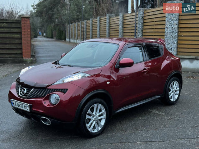 Червоний Ніссан Жук, об'ємом двигуна 1.6 л та пробігом 97 тис. км за 10750 $, фото 14 на Automoto.ua
