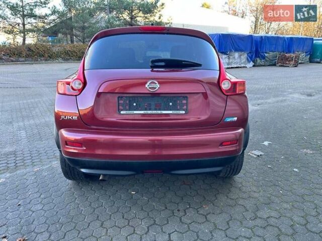 Красный Ниссан Жук, объемом двигателя 1.5 л и пробегом 155 тыс. км за 9800 $, фото 3 на Automoto.ua