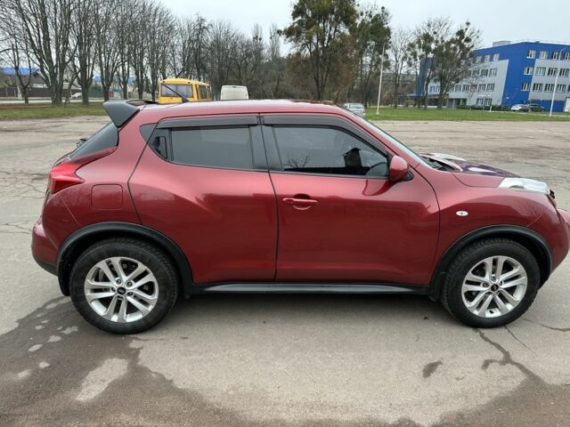 Красный Ниссан Жук, объемом двигателя 1.6 л и пробегом 214 тыс. км за 9000 $, фото 2 на Automoto.ua