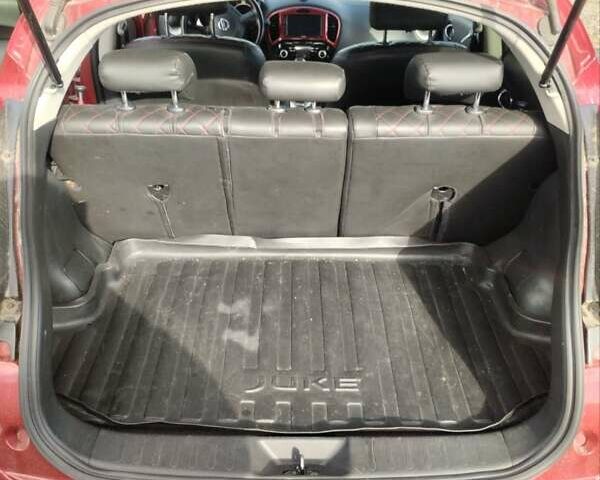 Червоний Ніссан Жук, об'ємом двигуна 1.6 л та пробігом 159 тис. км за 8900 $, фото 2 на Automoto.ua