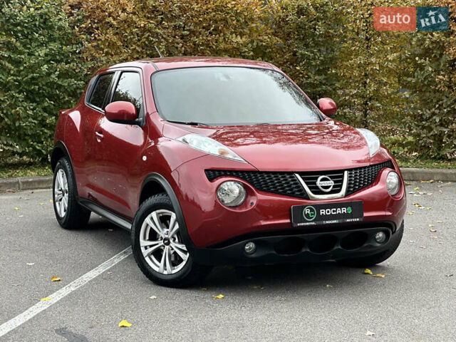 Красный Ниссан Жук, объемом двигателя 1.6 л и пробегом 130 тыс. км за 10500 $, фото 1 на Automoto.ua