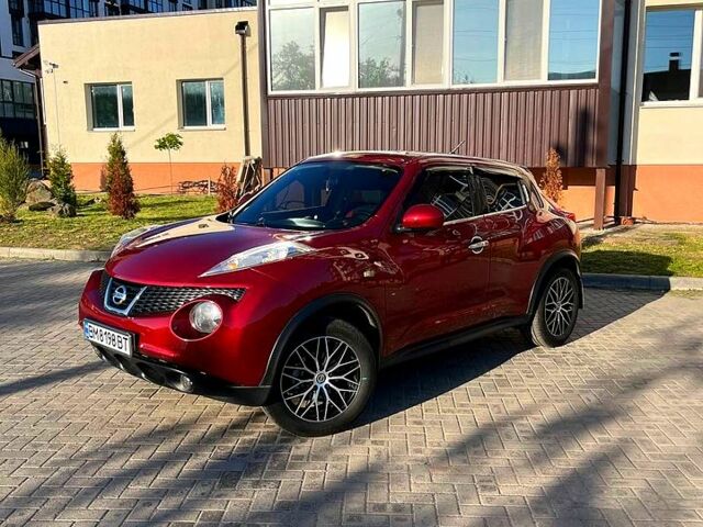 Красный Ниссан Жук, объемом двигателя 1.6 л и пробегом 95 тыс. км за 9300 $, фото 1 на Automoto.ua