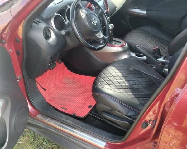 Червоний Ніссан Жук, об'ємом двигуна 1.6 л та пробігом 159 тис. км за 8900 $, фото 5 на Automoto.ua