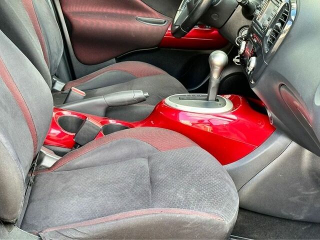 Красный Ниссан Жук, объемом двигателя 1.6 л и пробегом 123 тыс. км за 9000 $, фото 11 на Automoto.ua