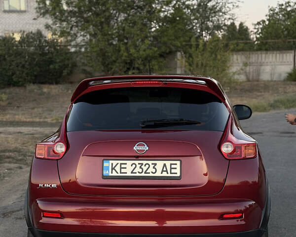 Красный Ниссан Жук, объемом двигателя 1.6 л и пробегом 168 тыс. км за 10900 $, фото 1 на Automoto.ua