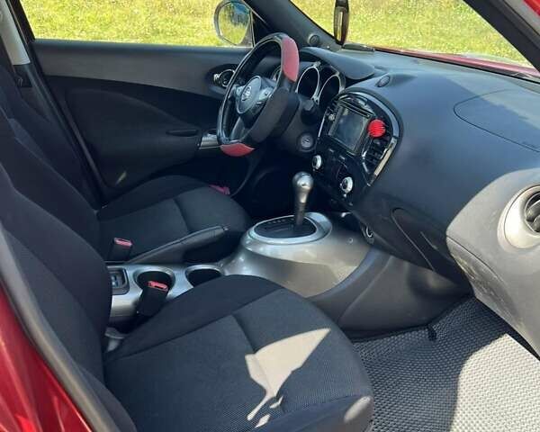 Красный Ниссан Жук, объемом двигателя 1.6 л и пробегом 125 тыс. км за 9700 $, фото 16 на Automoto.ua
