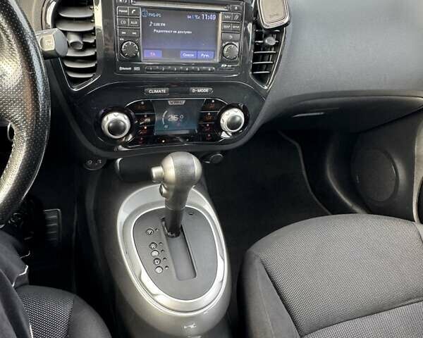 Красный Ниссан Жук, объемом двигателя 1.6 л и пробегом 117 тыс. км за 9900 $, фото 4 на Automoto.ua