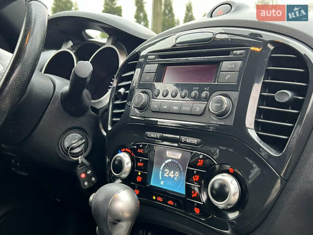 Червоний Ніссан Жук, об'ємом двигуна 1.6 л та пробігом 98 тис. км за 10999 $, фото 40 на Automoto.ua