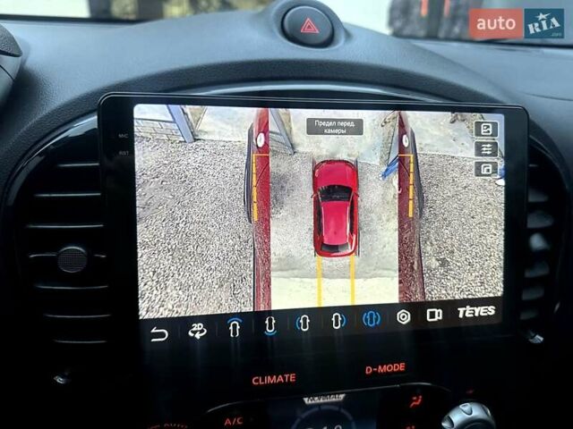 Червоний Ніссан Жук, об'ємом двигуна 1.6 л та пробігом 147 тис. км за 9999 $, фото 24 на Automoto.ua