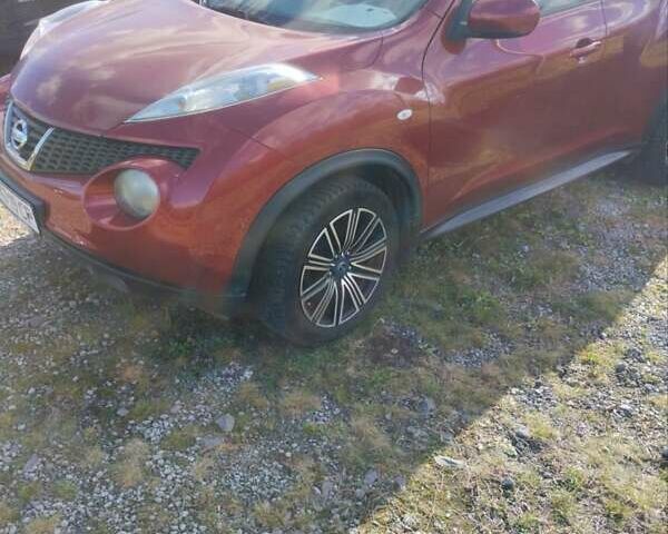 Червоний Ніссан Жук, об'ємом двигуна 1.6 л та пробігом 159 тис. км за 8900 $, фото 7 на Automoto.ua