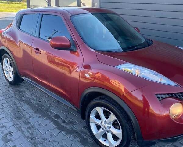 Червоний Ніссан Жук, об'ємом двигуна 1.6 л та пробігом 105 тис. км за 11450 $, фото 5 на Automoto.ua