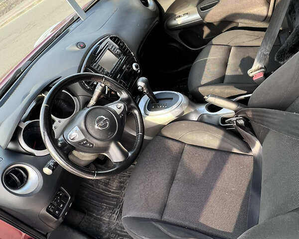 Красный Ниссан Жук, объемом двигателя 1.6 л и пробегом 61 тыс. км за 12500 $, фото 5 на Automoto.ua