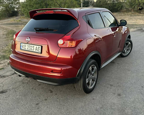 Красный Ниссан Жук, объемом двигателя 1.6 л и пробегом 168 тыс. км за 10900 $, фото 5 на Automoto.ua