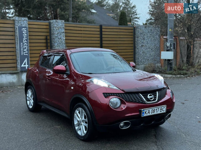 Червоний Ніссан Жук, об'ємом двигуна 1.6 л та пробігом 97 тис. км за 10750 $, фото 9 на Automoto.ua