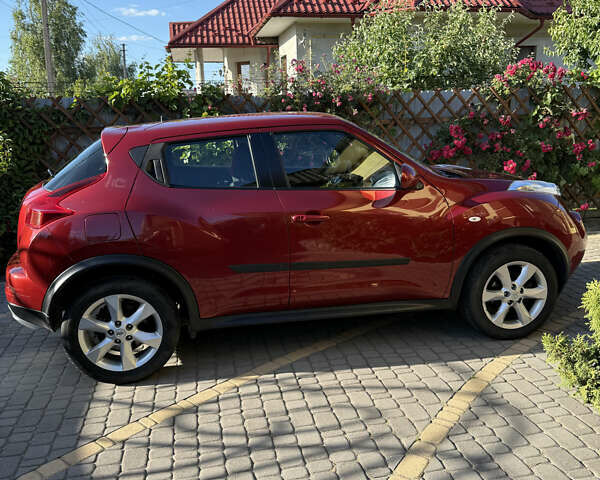 Червоний Ніссан Жук, об'ємом двигуна 1.6 л та пробігом 75 тис. км за 10200 $, фото 2 на Automoto.ua