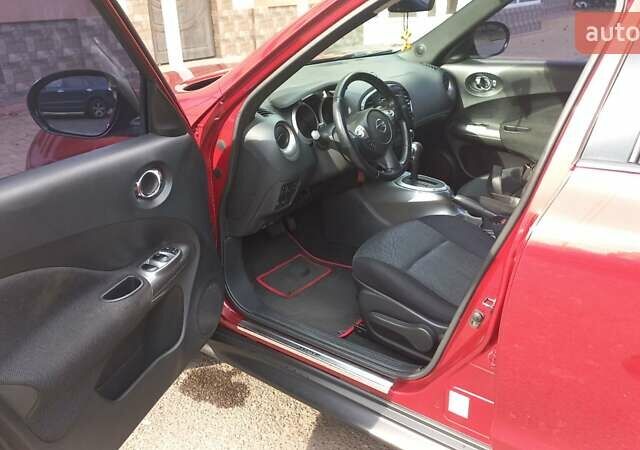 Червоний Ніссан Жук, об'ємом двигуна 1.6 л та пробігом 199 тис. км за 9700 $, фото 18 на Automoto.ua