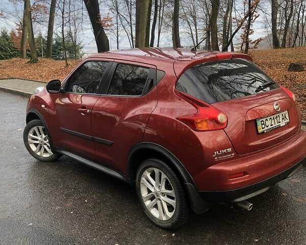 Червоний Ніссан Жук, об'ємом двигуна 1.6 л та пробігом 178 тис. км за 9000 $, фото 1 на Automoto.ua