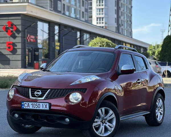 Красный Ниссан Жук, объемом двигателя 1.6 л и пробегом 198 тыс. км за 8300 $, фото 2 на Automoto.ua