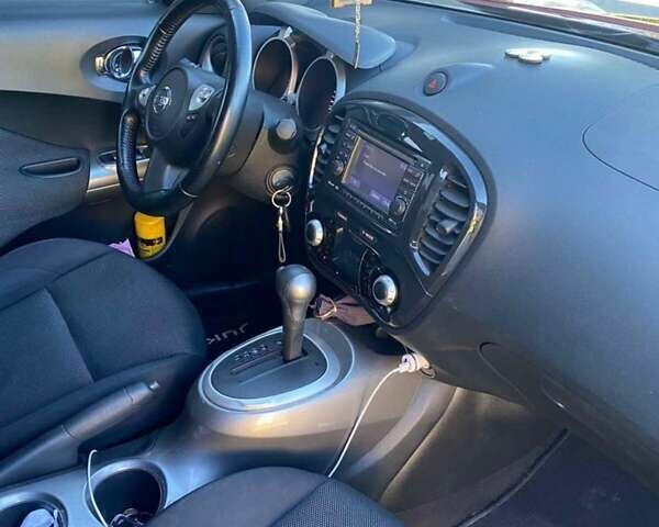 Червоний Ніссан Жук, об'ємом двигуна 1.6 л та пробігом 105 тис. км за 11450 $, фото 8 на Automoto.ua