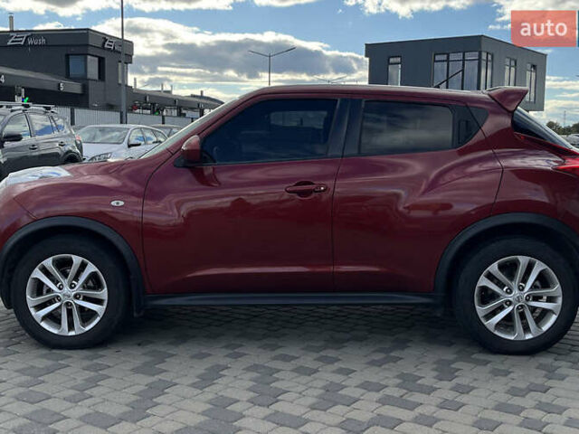 Красный Ниссан Жук, объемом двигателя 1.6 л и пробегом 209 тыс. км за 10900 $, фото 3 на Automoto.ua