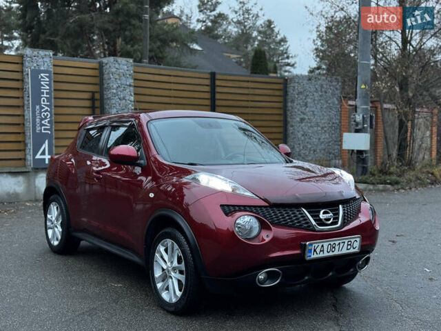 Червоний Ніссан Жук, об'ємом двигуна 1.6 л та пробігом 97 тис. км за 10750 $, фото 10 на Automoto.ua